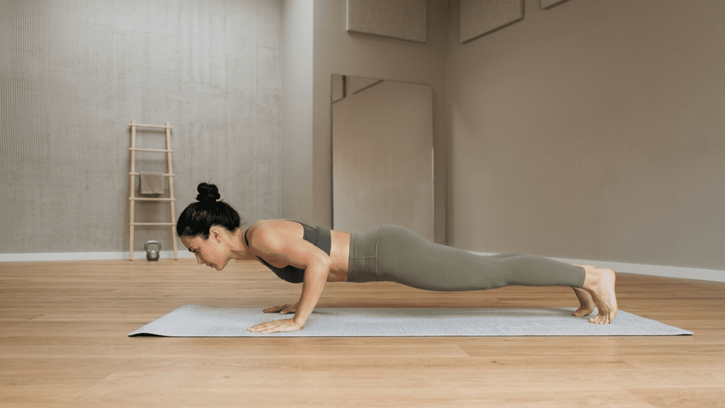 person performing strength exercises without equipment in a clean indoor space